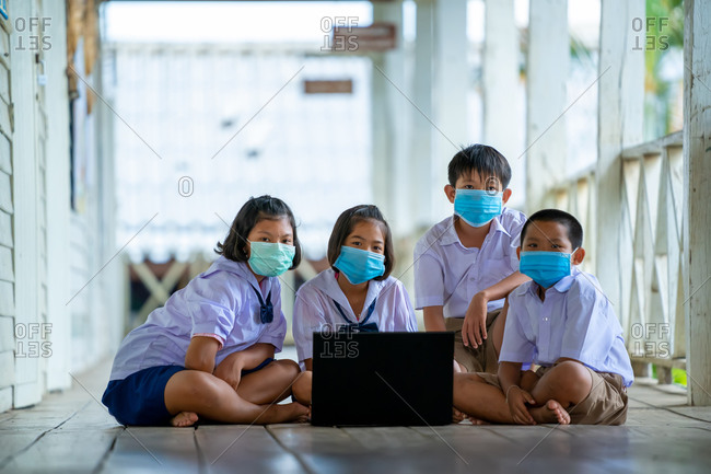 Group of students wearing protective masks