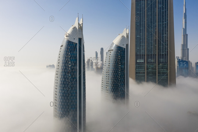 March 29, 2019: Aerial view of misty Twin Park Towers in Dubai, United Arab Emirates.