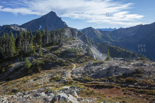 Hiking trail through vast alpine wilderness oin mountains