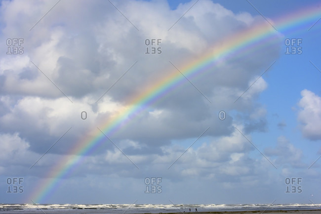 Germany, Lower Saxony, East Frisia, Juist, rainbow on the beach.