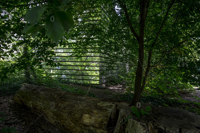July 14, 2020: Detail of the Spiegelhaus, a glass-covered building among trees in Treptower Park, Berlin, Germany