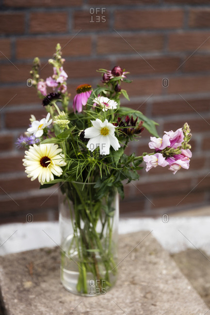 Vase with various summer flowers