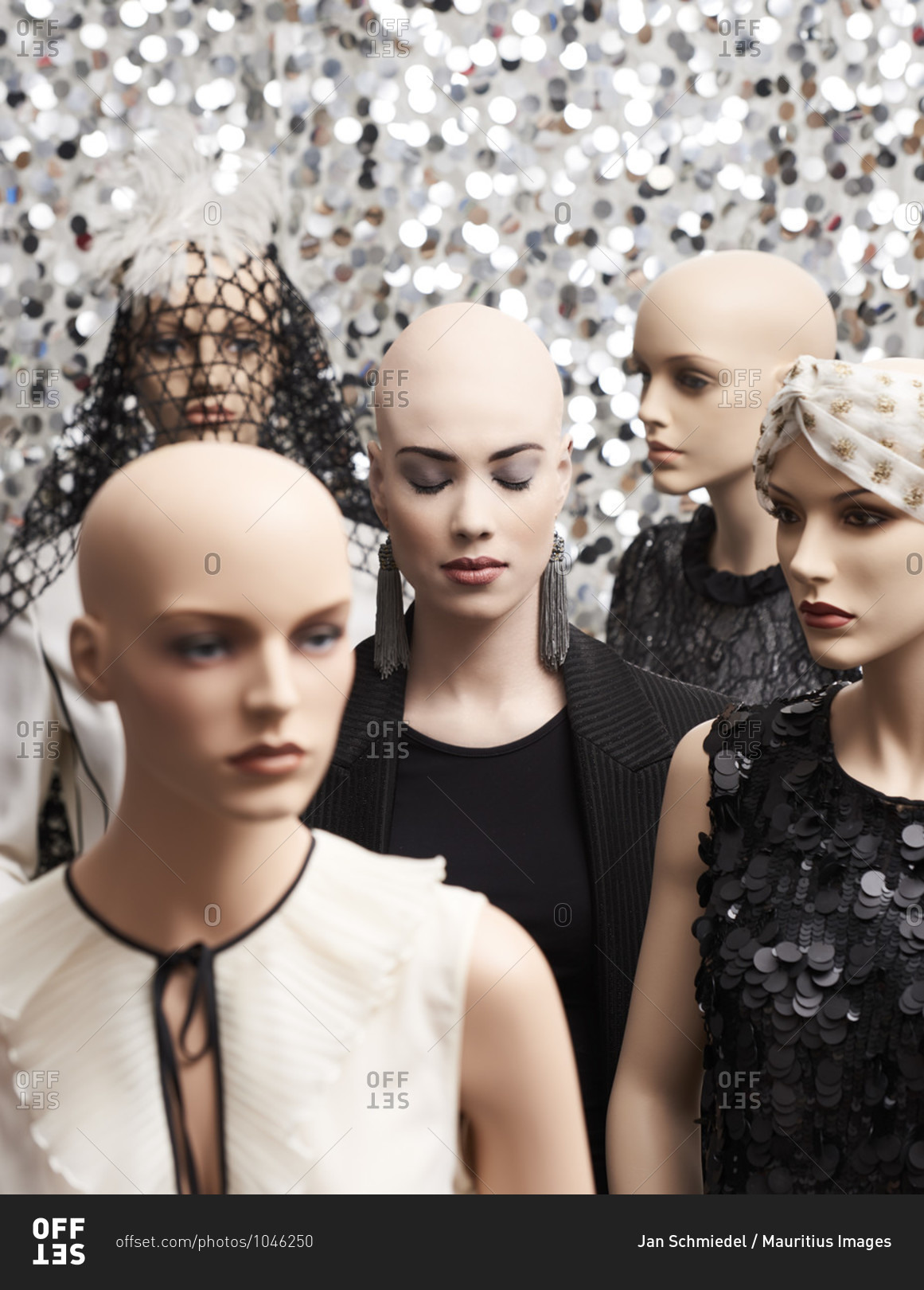 Woman / model and bald mannequins, decoration with fabrics