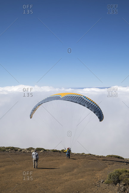 Paraglider starts at the lookout point Puerto de izana, el teide national park, unesco world heritage, tenerife, canary islands, Spain