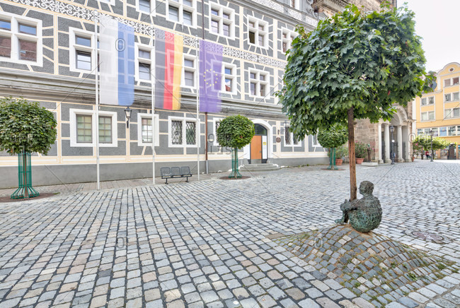 September 2, 2019: sculpture, kaspar's tree, former court chancellery, facade, montgelasplatz, ansbach, franconia, Bavaria, Germany, Europe
