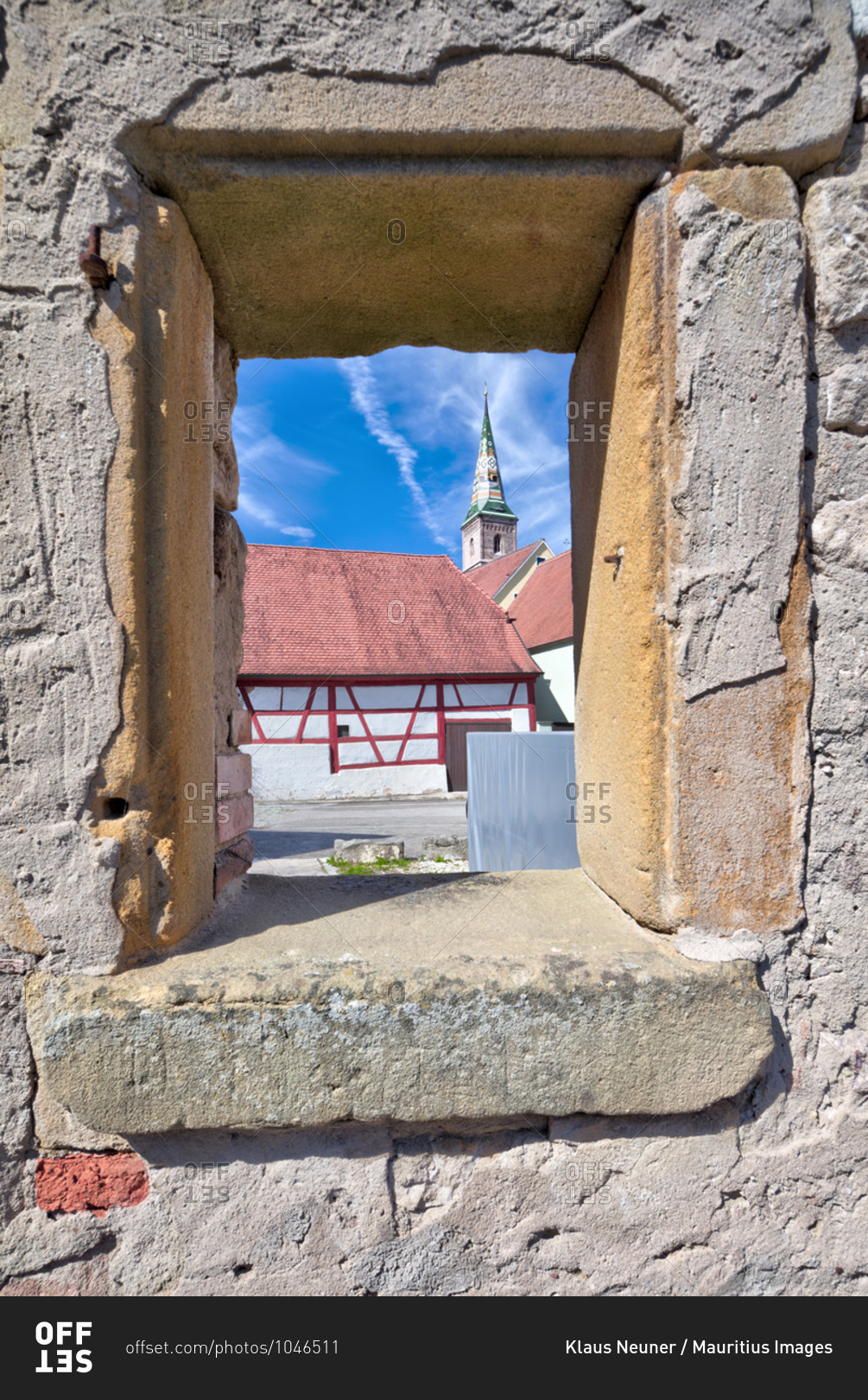 View through old wall, church tower, house facade, half-timbering, wolfram-eschenbach, franconia, Bavaria, Germany