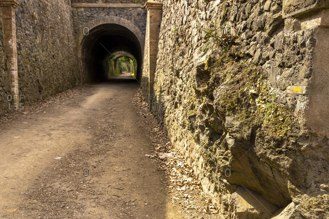 Europe, Spain, catalonia, girona province, la garrotxa, olot, hiking trail through a historic railway tunnel at olot