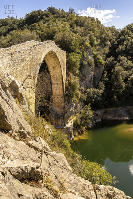 Europe, Spain, catalonia, girona province, la garrotxa, montagut, medieval bridge over the llierca river