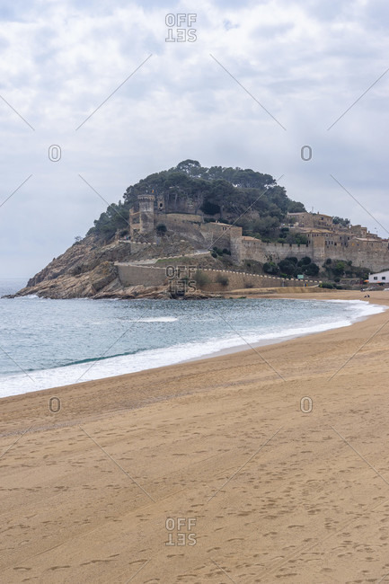 Europe, spain, catalonia, gerona province, la selva, tossa de mar, view of tossa de mar beach and the fortress on the hill at its end