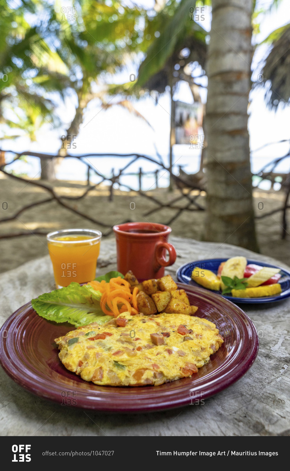 America, caribbean, greater antilles, dominican republic, cabarete, breakfast on the beach at the natura cabana boutique hotel & spa