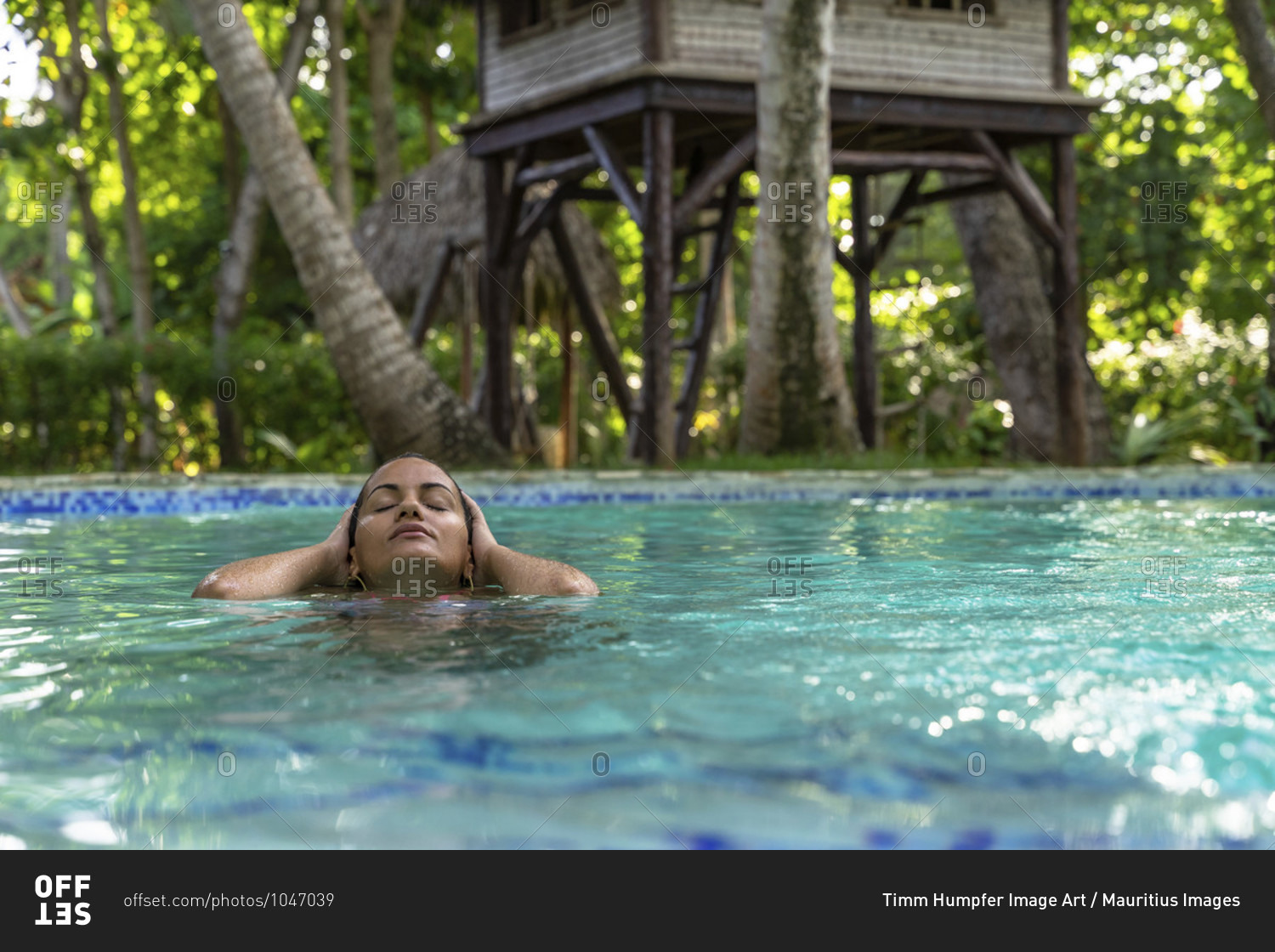 America, caribbean, greater antilles, dominican republic, cabarete, woman in the pool of the natura cabana boutique hotel & spa