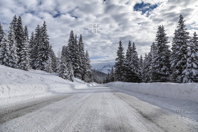 Snowy alpine road, falzarego pass, Cortina d'Ampezzo, Belluno, Veneto, Italy