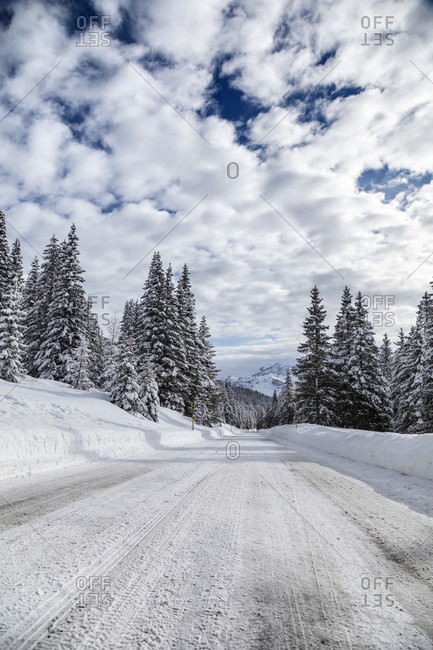 Snowy alpine road, falzarego pass, Cortina d'Ampezzo, Belluno, Veneto, Italy