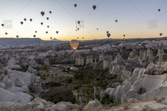 September 29, 2019: Hot air balloon in the morning in the eroded landscape near Goreme, Cappadocia, Anatolia, Turkey