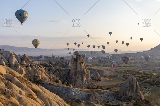 September 26, 2019: Hot air balloon in the morning in the eroded landscape near Goreme, Cappadocia, Anatolia, Turkey