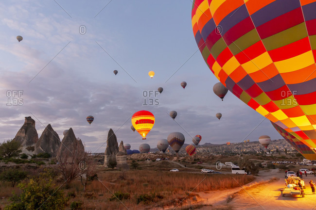 September 26, 2019: Hot air balloon in the morning in the eroded landscape near Goreme, Cappadocia, Anatolia, Turkey