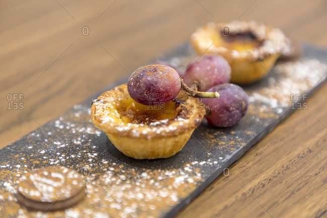 Pastel de Nata or Pastel de Belem is a puff pastry tart with pudding, very popular in Portugal