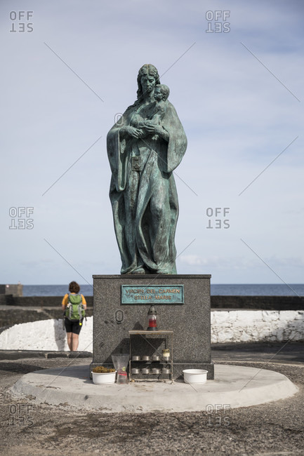January 27, 2020: The Virgen Del Carmen statue in the port of Puerto de la Cruz, Tenerife, Canary Islands, Spain