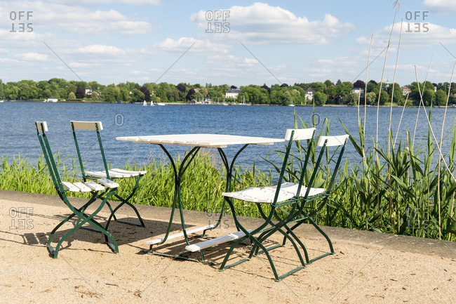Berlin, Wannsee, Liebermann Villa, garden, riverside path with table and chairs, lake view
