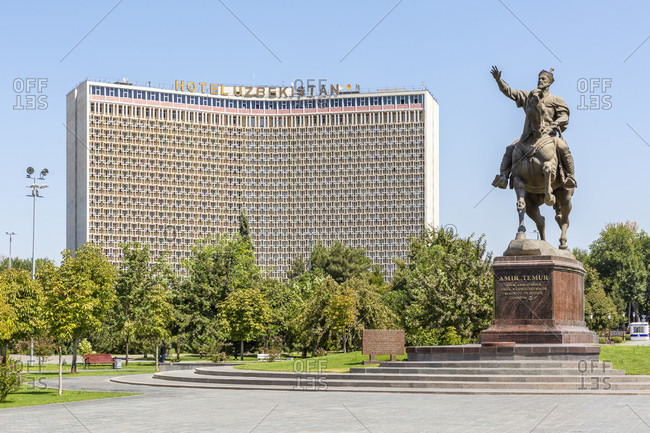 August 19, 2019: Hotel Uzbekistan and Amir Timur equestrian statue, Amir Timur Square, Tashkent, Uzbekistan