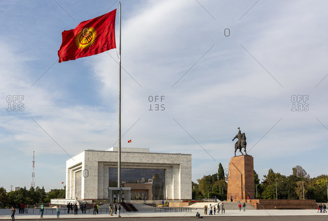 August 17, 2019: Mana's equestrian statue and National Museum on the north side of Alatoo Square, Bishkek, Kyrgyzstan