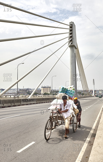May 13, 2013: Shah Amanat Bridge over River Karnaphuli, Chittagong, Bangladesh; Shah Amanat Bridge, the third constructed across the Karnaphuli River in Bangladesh, is the first major extra-dosed bridge in the country. It is located along country's busiest national highway N1. Karnaphuli (Karnafuli) is the largest and most important river in Chittagong and the Chittagong Hill Tracts.