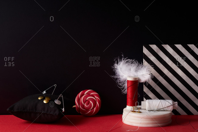 Black Thread with a Needle and Spool of Thread Stock Image - Image