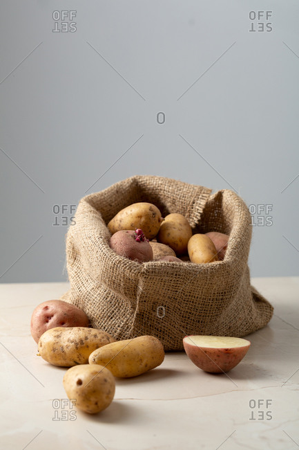 Burlap sack bag full of potatoes
