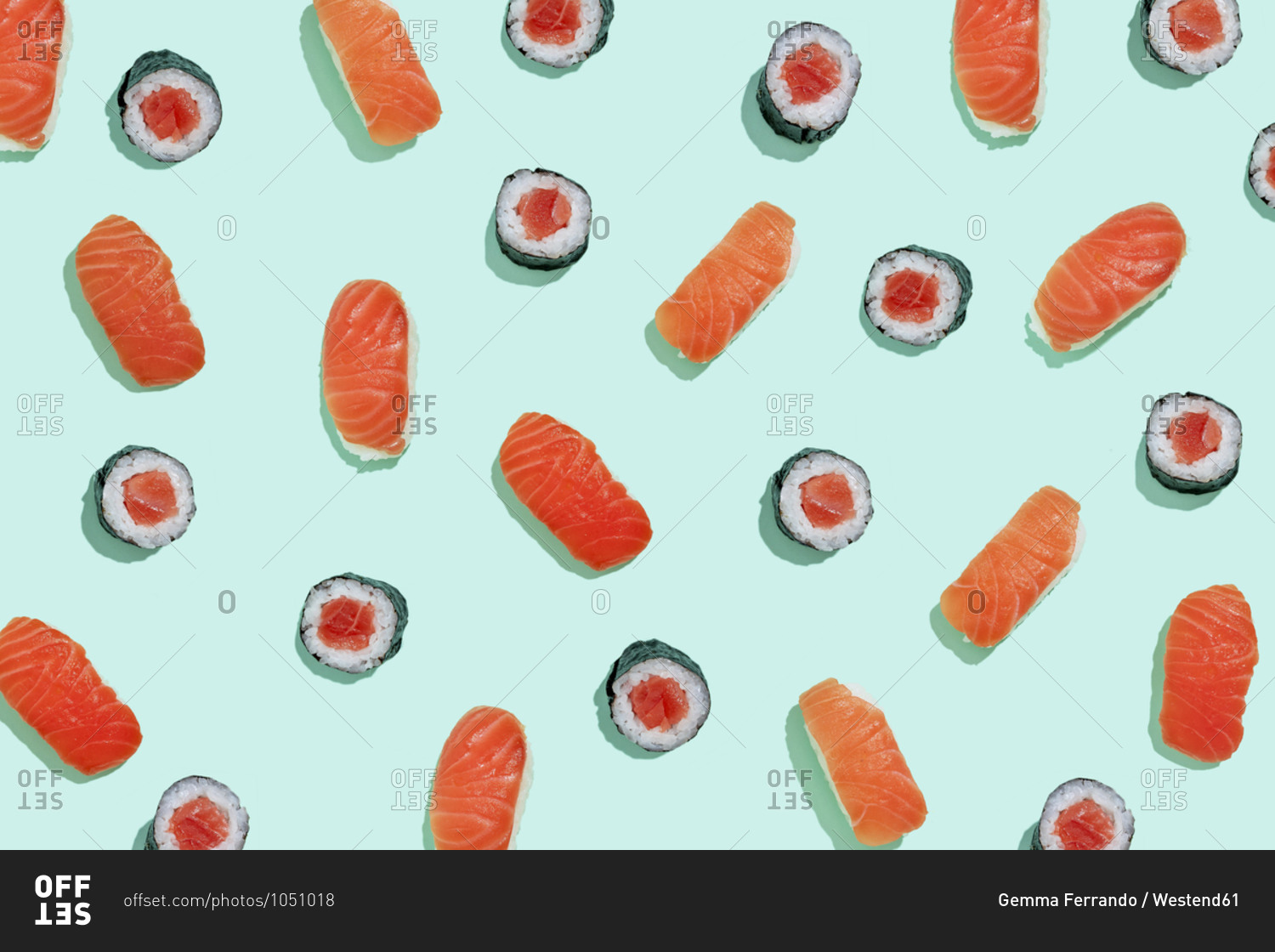 Salman sushi nigiri and maki pattern on mint green background