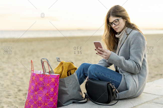 Young Woman With Shopping Bags Paris Stock Photo - Download Image