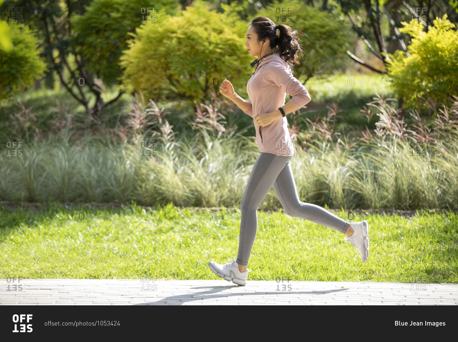 Premium Photo  Photograph Woman running in a park with jogging clothes