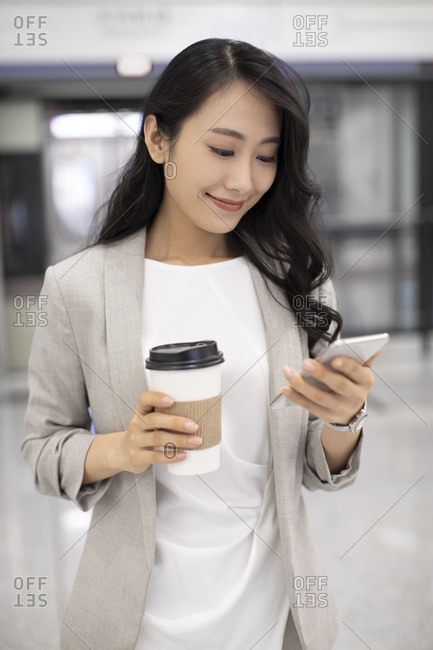 Young Chinese businesswoman in subway station