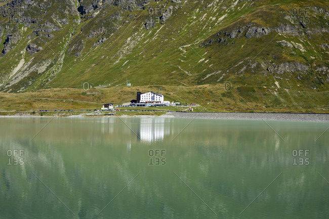 Austria, montafon, the mountain inn piz buin on lake silvretta.