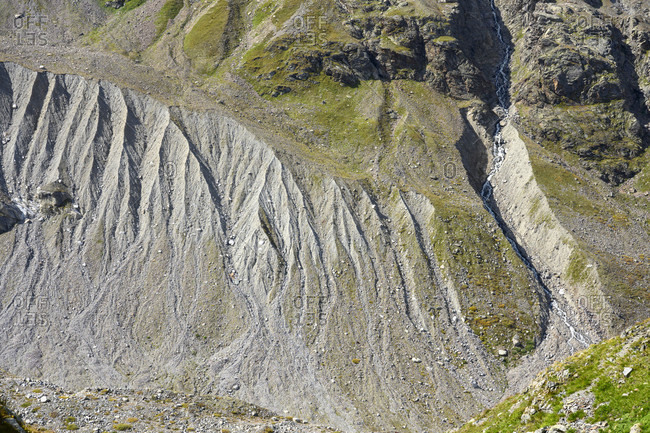 Austria, montafon, view from the wiesbadener hutte. soil erosion below the snow bell and the shadow tip.