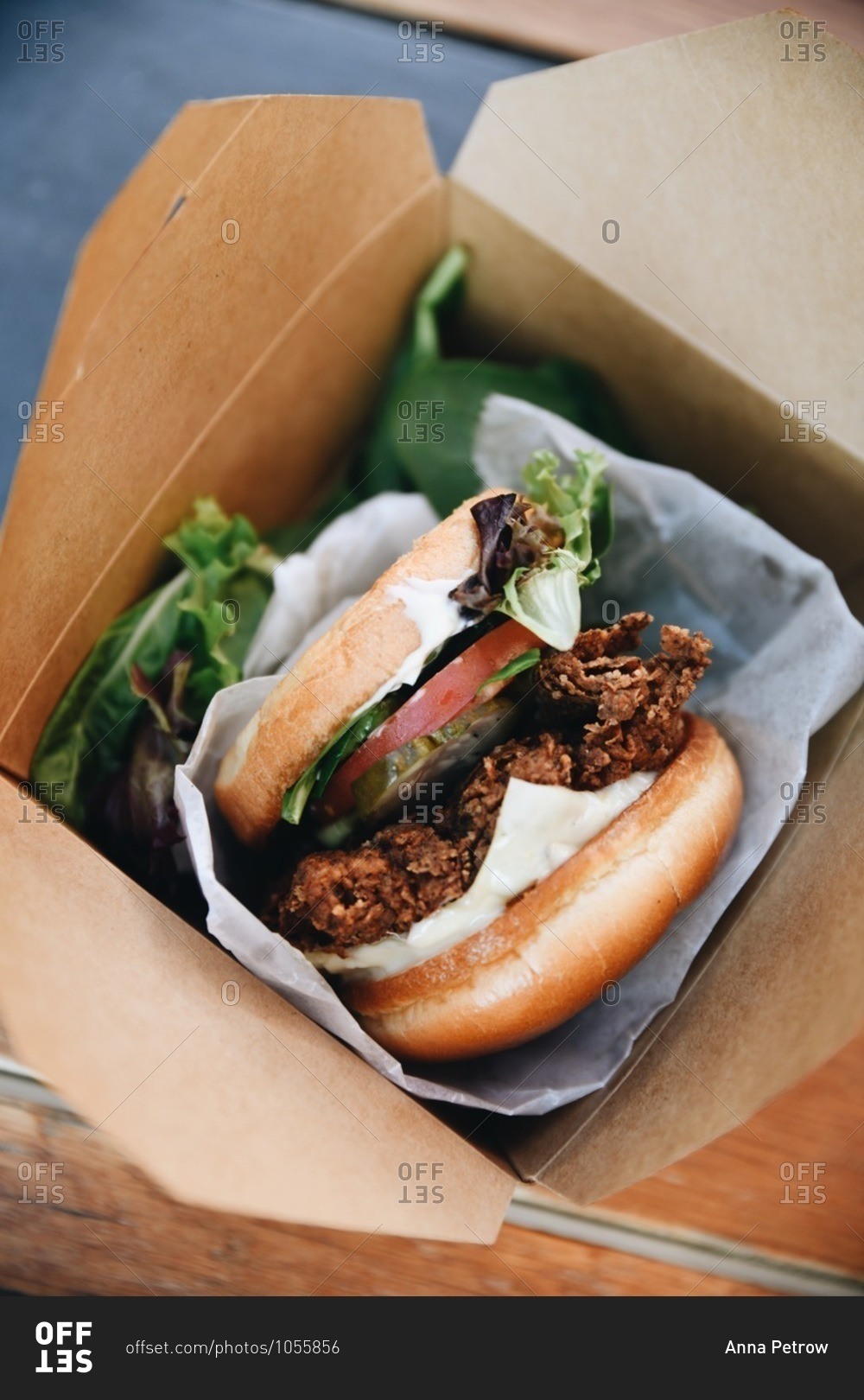 Fried chicken sandwich in a box from a take-out restaurant