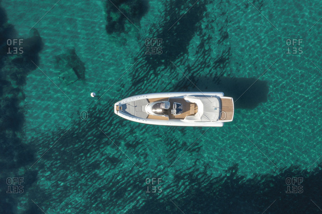 Aerial view of yacht in blue sea in Saint Tropez, France.