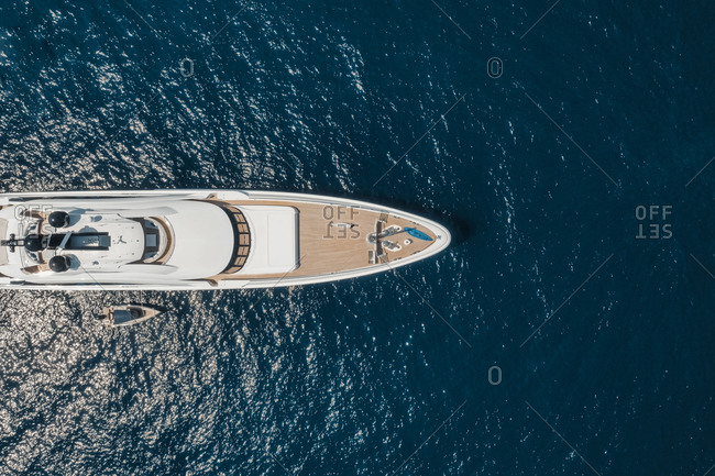 Aerial view of yacht in blue sea, Saint Tropez, France.