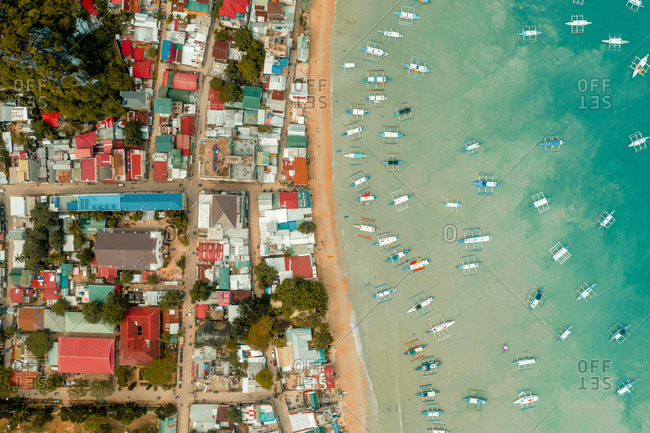 Aerial view of outriggers moored in harbour, El Nido, the Philippines.