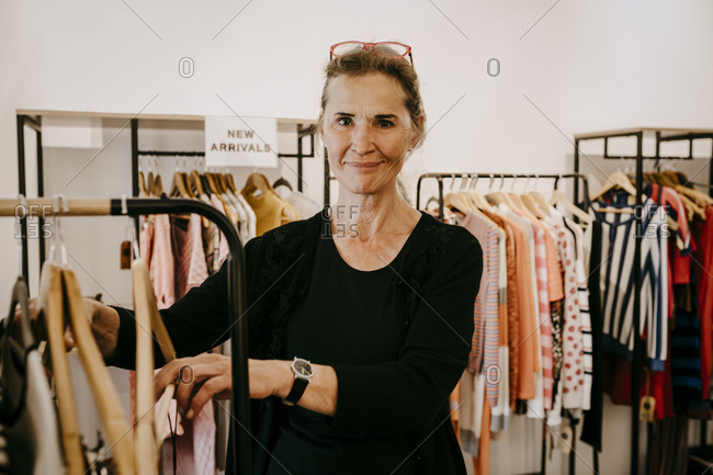 Women Buying Clothes In Clothes Store Stock Photo, Picture and