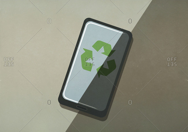Green recycling symbol on smart phone screen