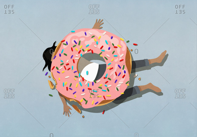Large sprinkle donut crushing woman