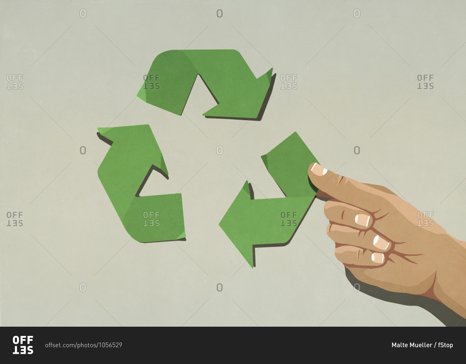 Hand assembling green recycling symbol arrows