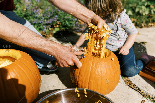 kids carving pumpkins