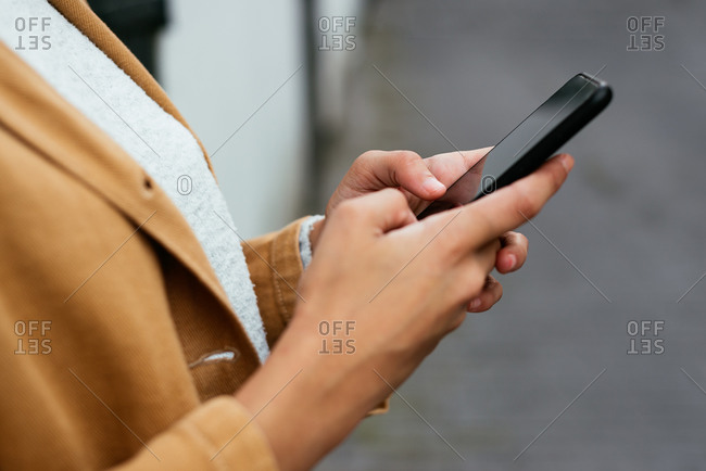 Closeup of a woman using smartphone