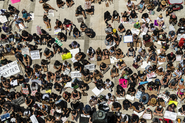 Honolulu, HI, United States - July 1, 2019: People sitting in Black Lives Matter Protest at Hawaii State Capitol
