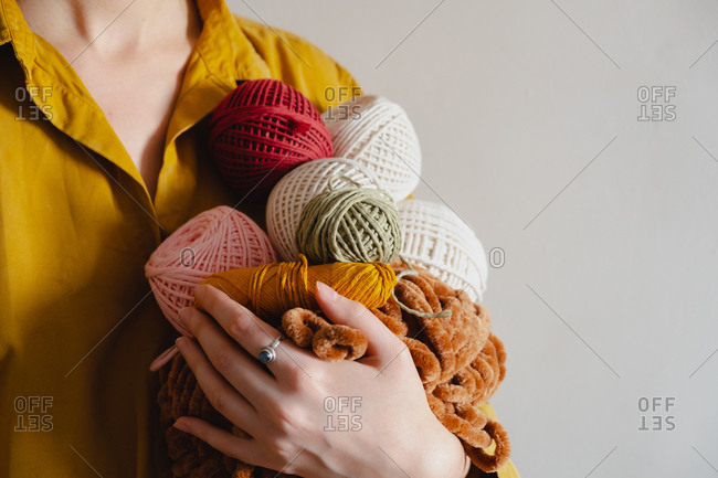 Girl Holding in Hand on of the Crochet Yarn Ball Stock Image