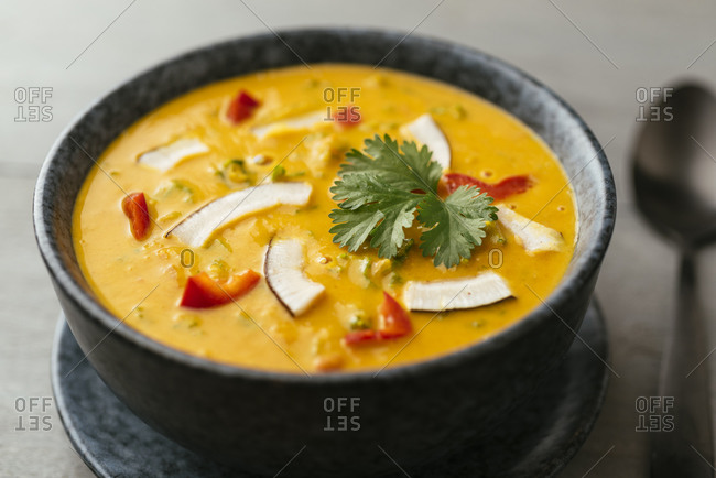 Home made vegan Thai curried red kuri squash soup with kale