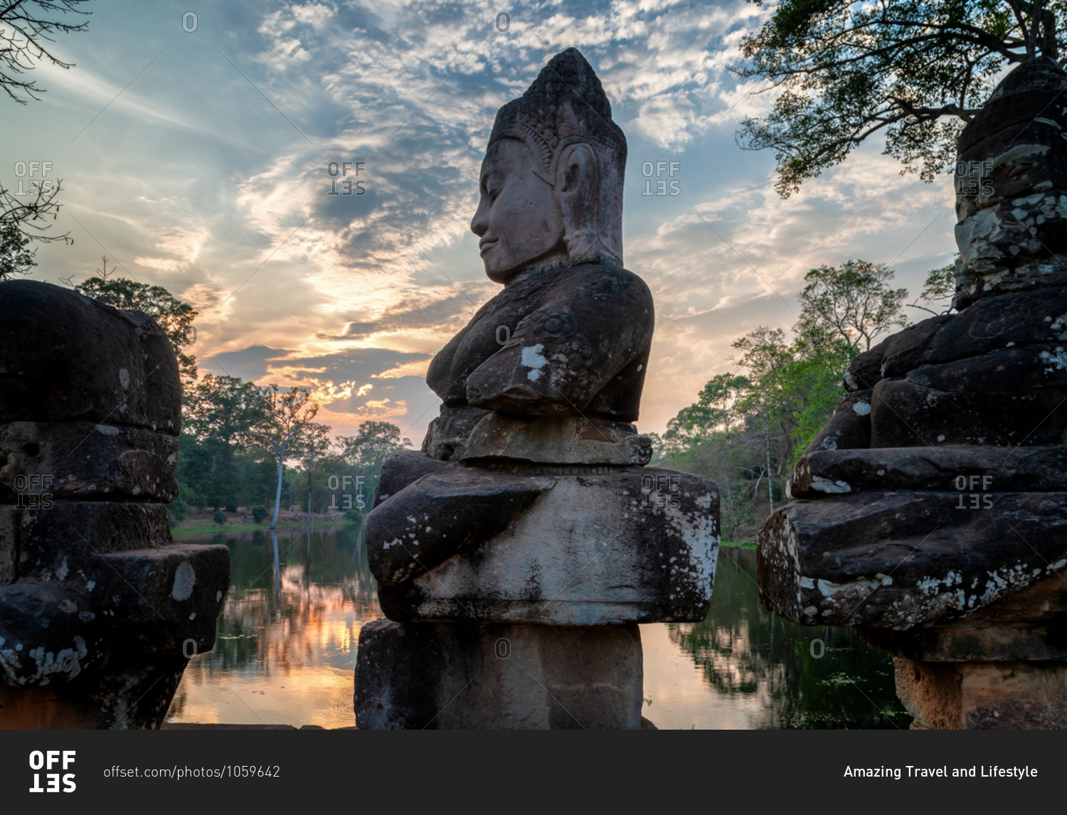 Angkor Archaeological Park, Siem Reap, Cambodia. South gate of Angkor Thom.  Good gods in hindu epic tale of a tug of war between good vs evil in the story the churning of the sea of milk.