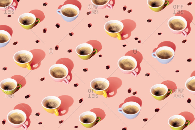 Pattern of roasted coffee beans and coffee cups