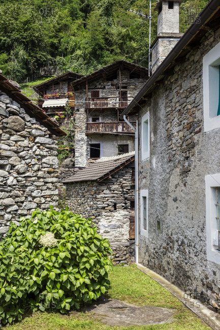 Italy- Province of Sondrio- Borgonuovo- Stone houses in rustic village